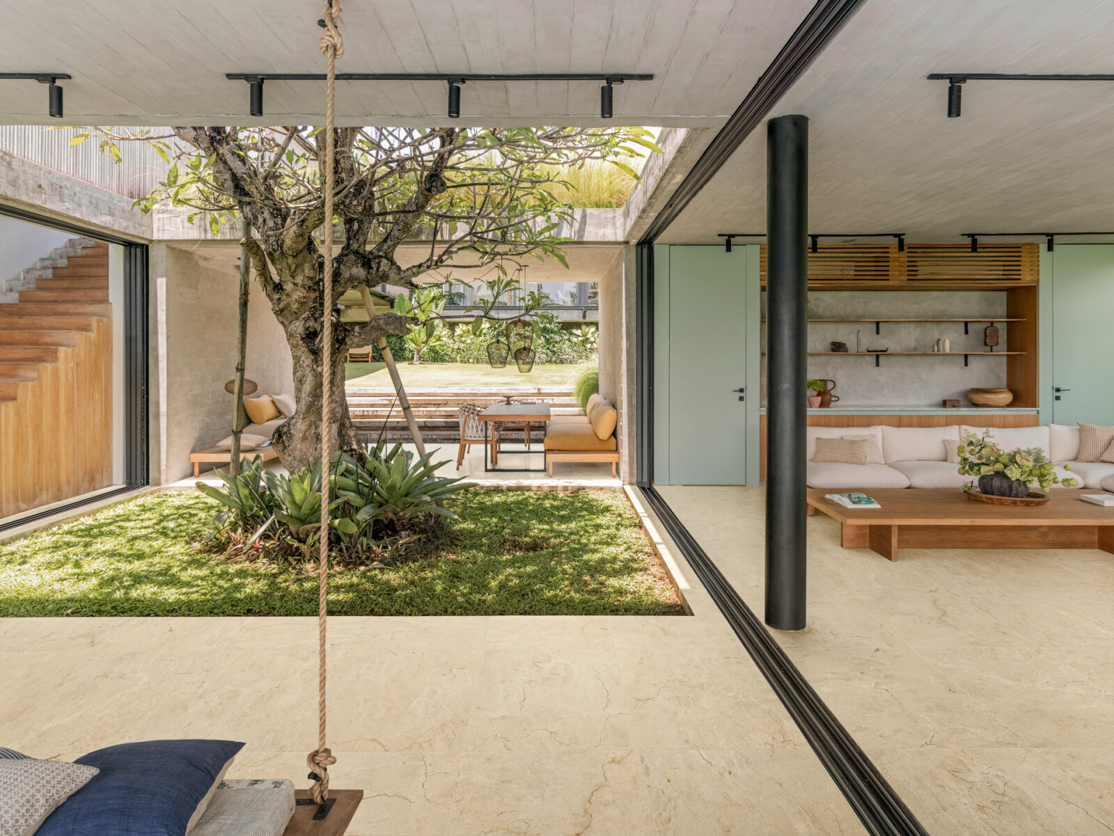 Outdoor pavers in a tropical villa with indoor-outdoor living